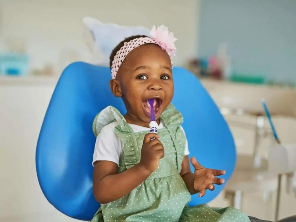 Pediatric Dentistry of Fort Myers child with toothbrush