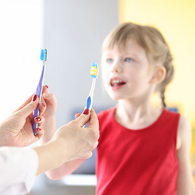 Cute, young girl at pediatric dentist's office