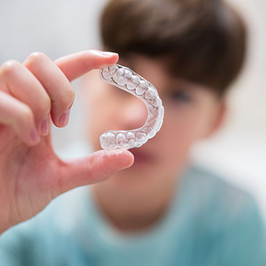 Cute, young girl at pediatric dentist's office